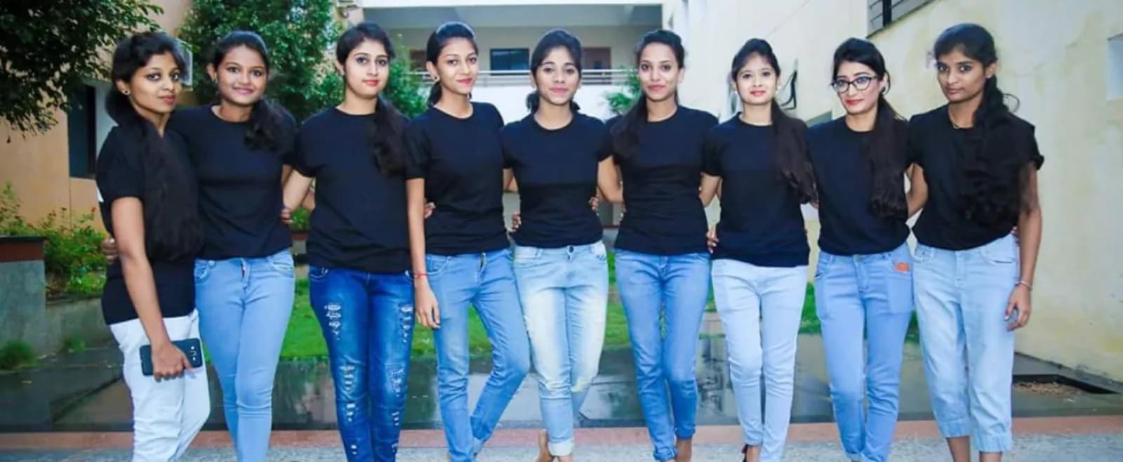 Bharat college students standing together in the campus courtyard